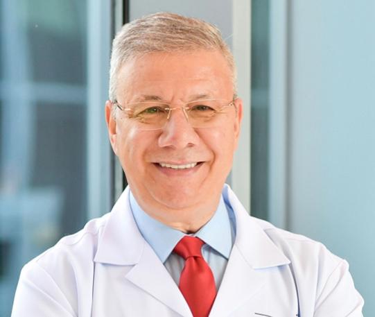 Dr-Fekry-White-Coat.jpg